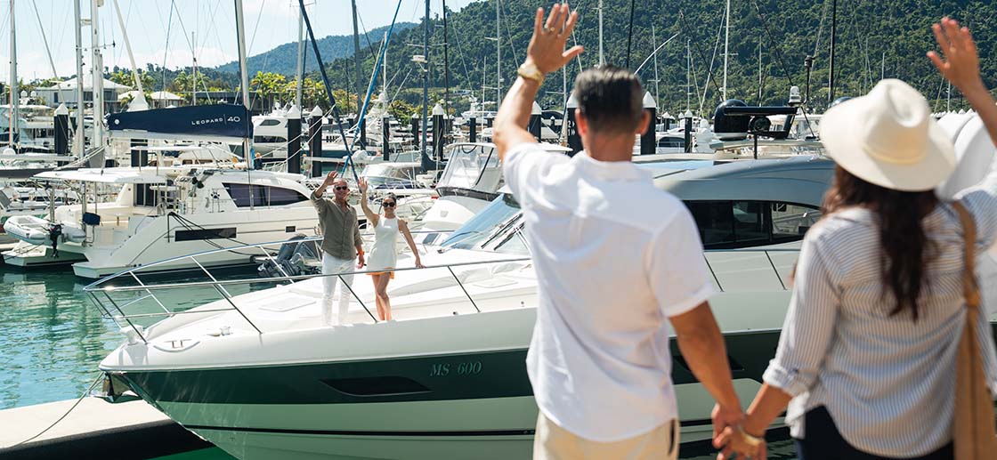 Beneteau Oceanis 52 yacht sailing with a man and woman on the back