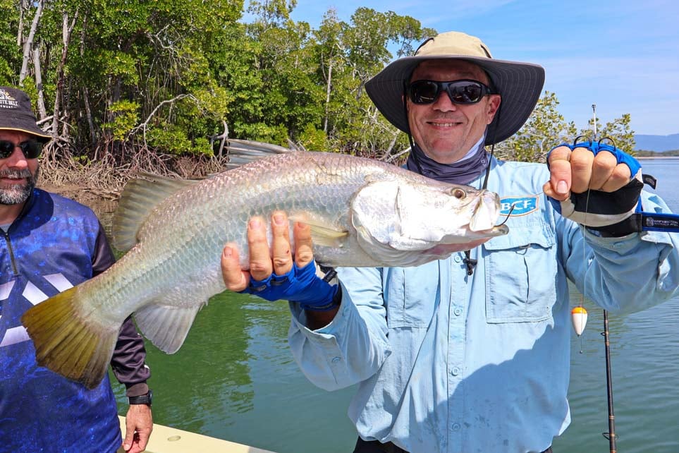 Man holding barramundi