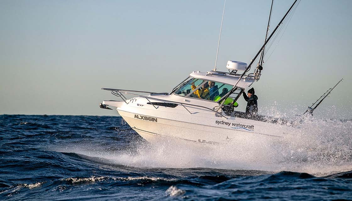 Fishing boat looking for fish in tournament