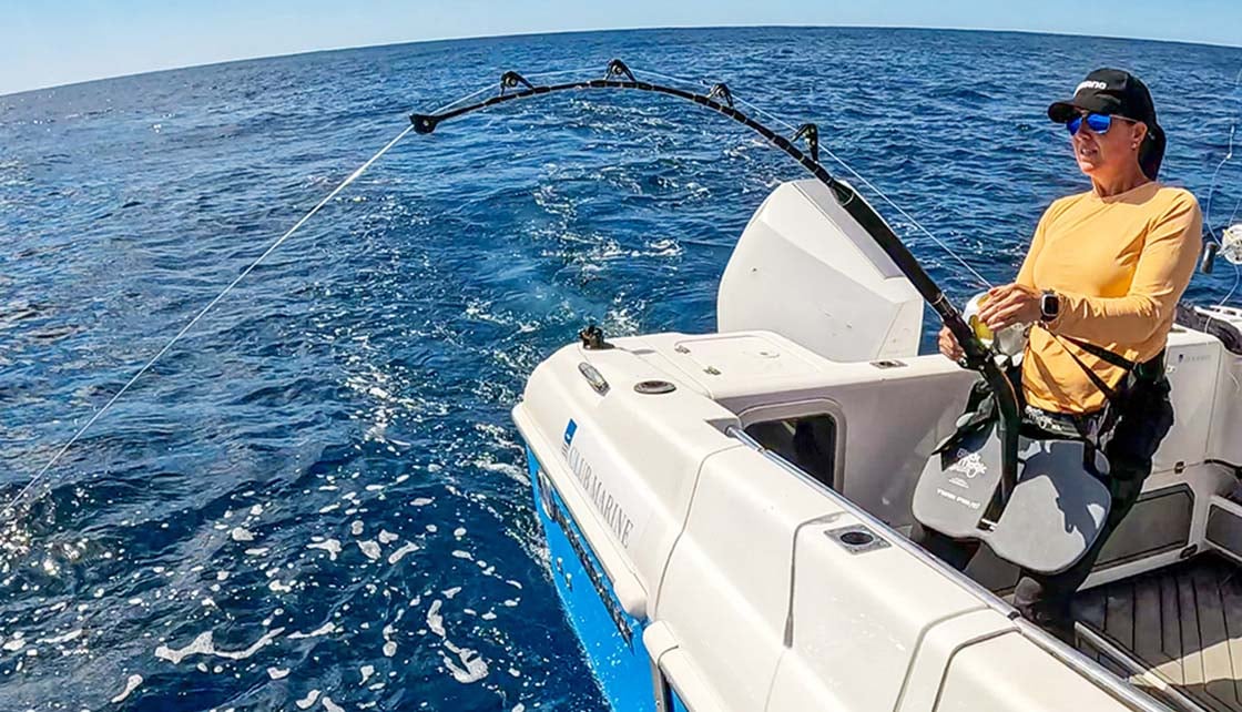 Fishing off back of boat in tournament